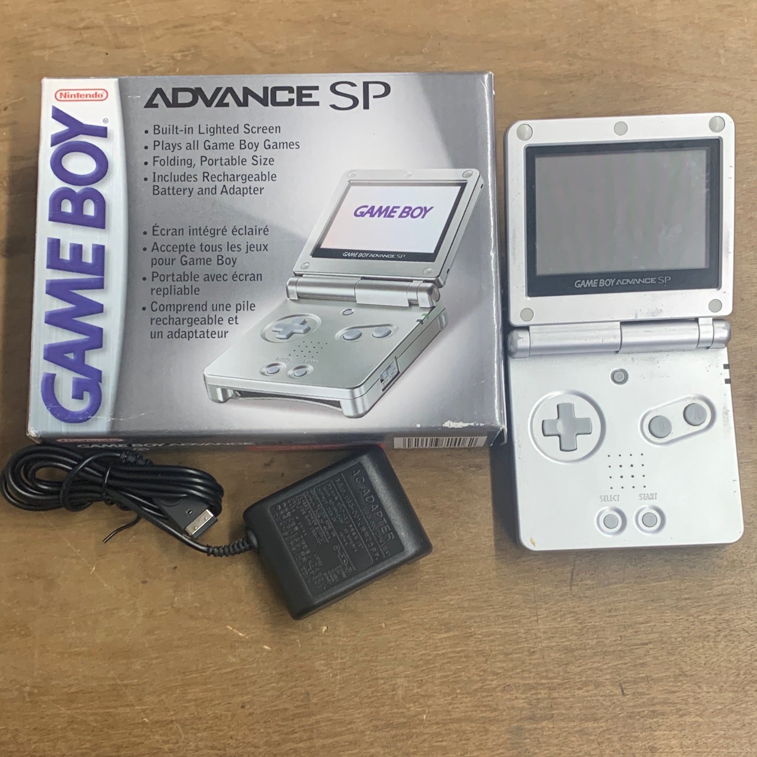 Nintendo Game Boy Advance SP in Platinum buy with games